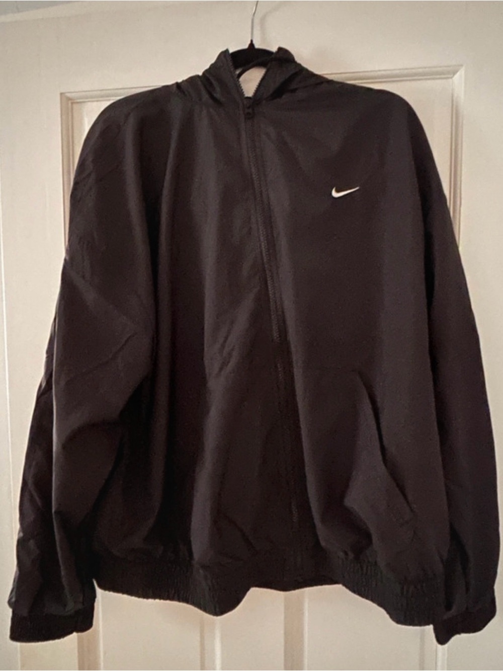 Nike women’s loose fitted uv hooded jacket